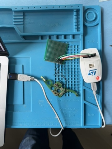 The debugger attached to the circuit board. Not pictured: the power supply needs to be connected as well to supply power to the microcontroller.